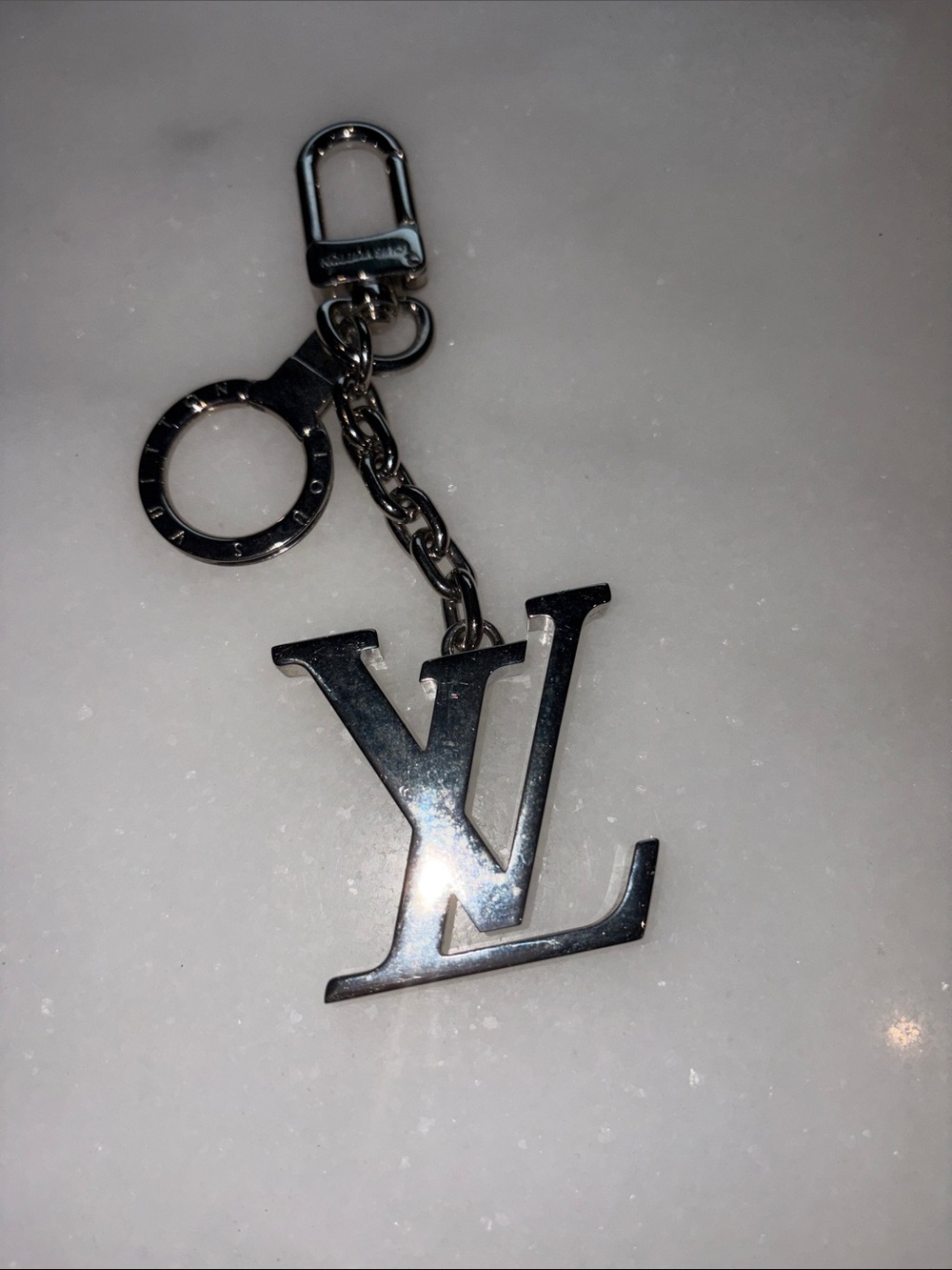 Louis Vuitton Silver LV Logo Keyring